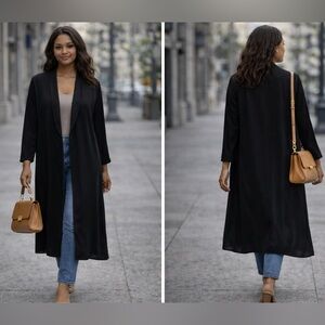 Stylein Silk Black Cardigan- size S
Length 50 in, little flaw on the left edge